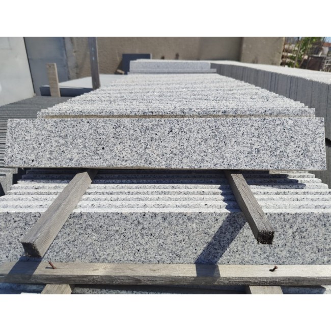 Облицовочная плитка гранит, светло-серый, полированный, 600x100x20 мм. Облицовочная плитка гранит, светло-серый, полированный, 600x100x20 мм.